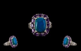 Opalina and Amethyst Halo Ring, a 4.6ct rectangular cushion cut of opalina, the rare, natural mix of