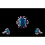 Opalina and Amethyst Halo Ring, a 4.6ct rectangular cushion cut of opalina, the rare, natural mix of