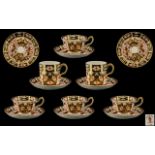 A Set of Royal Crown Derby Cigar Pattern Cups and Saucers.