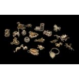Mixed Collection Of 20 Silver Charms To Include A Dragon, Church, Troy Horse, Stork, Cat,