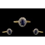 Ladies 18ct Gold Attractive Sapphire and Diamond Set Cluster Ring. Flower head Setting.
