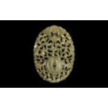 Chinese Antique Carved Jade Oval Piece fine detailing with fret work apertures, depicting an urn