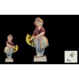 Katzhutte Porcelain Figure Early 20th Century Hand Painted figure of a young girl holding a parasol.