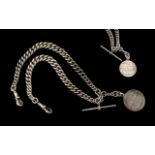 A Good Quality Double Sterling Silver Watch Albert Chain with Attached T-Bone and Fob.
