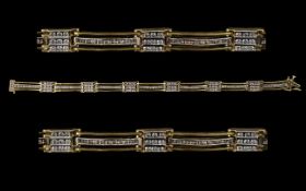 Ladies 14ct White & Yellow Gold Nice Quality Diamond Set Bracelet of Pleasing Design. Marked for