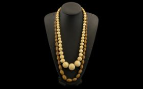 Antique Graduated Ivory Bead Necklace Length 25 Inches, Beads Ranging In Size From 27mm To 9mm,