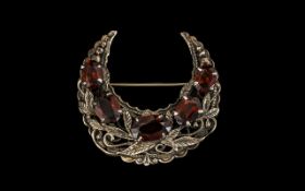 Antique Turkish Style Crescent Shaped Brooch with intricate silver leaf decorations, surmounted with