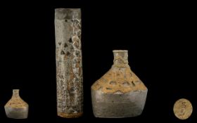 Two Art Pottery Vases, Thickly Potted with Lava Glaze of Cylindrical Shape.