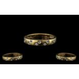 9ct Gold and Diamond Ladies Band - Set with 10 Small Diamonds Ring. Ring Size - R. Please See Image.