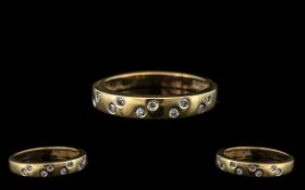 9ct Gold and Diamond Ladies Band - Set with 10 Small Diamonds Ring. Ring Size - R. Please See Image.