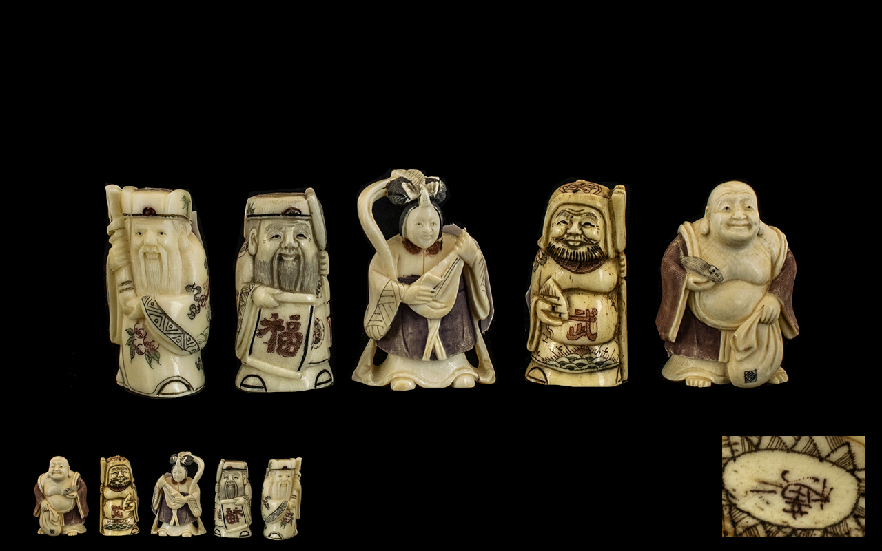 A Collection of Five Japanese Carved Ivory Netsuke depicting a Buddha,