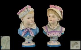 A Top Quality Pair of Late 19th Century Large and Impressive Hand Painted Bisque Pedestal Busts of