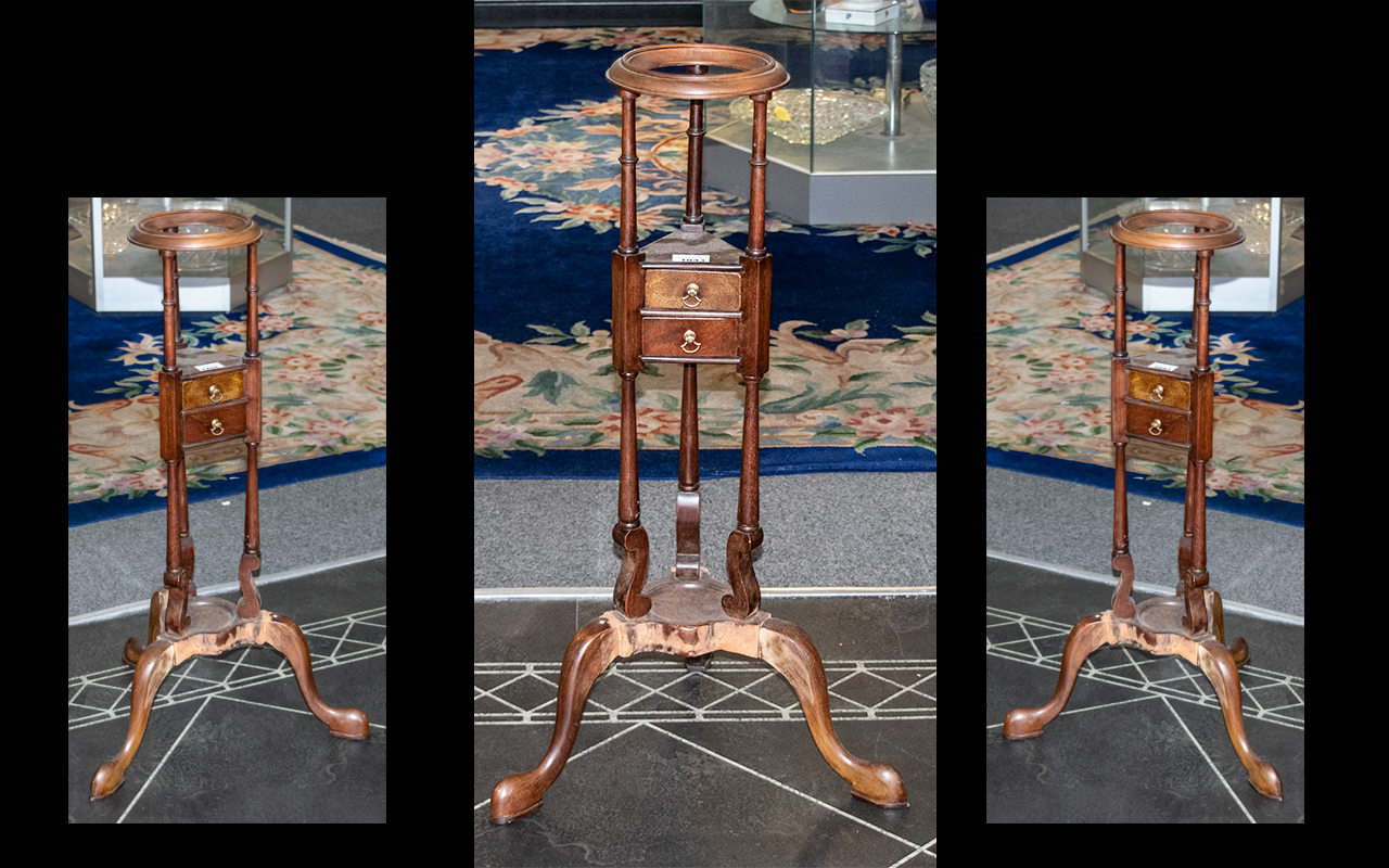 A Small Mahogany Georgian Style Wig Stand with two small drawers terminating on three cabriole legs.