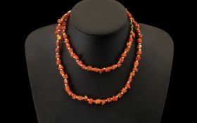 Red Coral Bead Necklace. 30 Inches In length, with Ring Clasp.