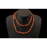 Red Coral Bead Necklace. 30 Inches In length, with Ring Clasp.