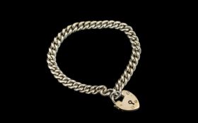 Silver Albert Chain hallmarked silver, Albert with heart shaped lock. 18'' in length. Please confirm