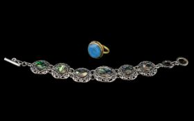 An Opal Stone Bracelet together with a Jade stone Ring.