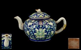 A Small Chinese Teapot in the Famille Rose decoration, Republic period. Character marks to base.