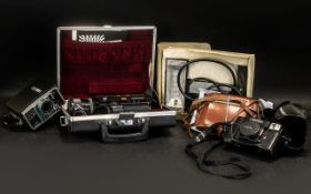 A Collection of Cameras to include Kodak 66 camera in a brown leather case circa 1950's,