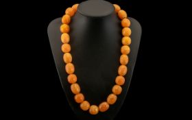 1930's Amber Coloured Necklace. 20 Inches - 50 cm long. Weight 74.8 grams.