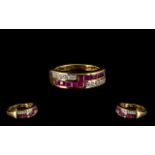 Ruby Band Ring, a double row ring comprising 1.2cts of closely set, square cut rubies running