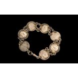 Silver Coin Bracelet, Some of the Coins Dating Back to the Victorian Days. 7 Inches In length.