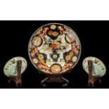 Japanese 18th Century Imari Decorated Dish of usual palette and form. Highlighted in gilt work, with