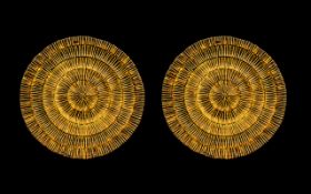 Pair of Svaja Scandinavian Glass Chargers in beautiful gold and amber circular design, each measures