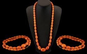 Amber Coloured Long Graduated Necklace From The Early 20th Century Period. Length 30 Inches - 75 cm.