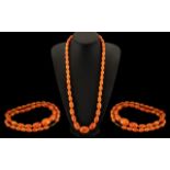 Amber Coloured Long Graduated Necklace From The Early 20th Century Period. Length 30 Inches - 75 cm.