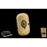 Antique Ivory Ladies Purse, blue silk lined to the interior, silver crest inlaid to the top, a