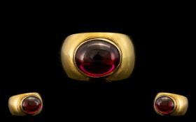 18ct Gold Ruby Ring Plain Form Set With An Oval Cabochon Ruby (11.5 x 9.5 x 5.