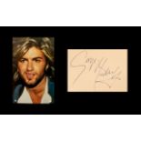 George Michael Pop Star Autograph on a Page From Album Plus Photo.