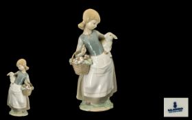 Lladro - Porcelain Figure ' Girl with Lamb ' Model No 4835. Issued 1972 - 1991. Height 9.