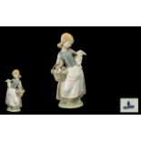 Lladro - Porcelain Figure ' Girl with Lamb ' Model No 4835. Issued 1972 - 1991. Height 9.