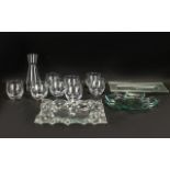 A Modern Carafe and Eight Glasses Set plus 3 glass serving dishes.