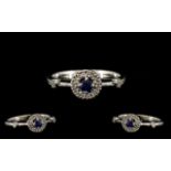 18ct White Gold - Attractive and Elegant Diamond and Sapphire Set Dress Ring, Flower head Design.