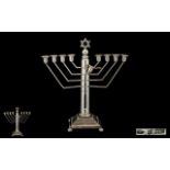 Silver Hanukkah Menorah Surmounted With Star Of David Above A Circular Tapering Column Raised On A