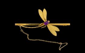 9ct Gold Dragonfly Brooch Textured Wings With Amethyst Body And Ruby Eyes, Marked 9ct.