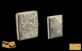 A Fine Quality - Solid Silver Cigarette Case with Chased Leaf Decoration to Both Sides,