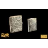 A Fine Quality - Solid Silver Cigarette Case with Chased Leaf Decoration to Both Sides,