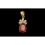 14ct Gold Attractive Garnet and Diamond Set - Pendant Drop of Small Proportions. Marked 14 kt.