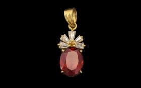 14ct Gold Attractive Garnet and Diamond Set - Pendant Drop of Small Proportions. Marked 14 kt.