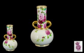 Mintons Rose Decorated Twin Handled Vase Globular Form With Long Neck, Gilt Moulded Handles,