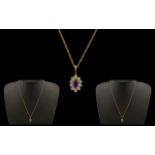 9ct Gold Diamond and Amethyst Pendant on 9ct Gold Chain. Please See Accompanying Image.