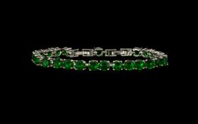 Ladies Emerald Green Tennis Bracelet - Stamped 925 Silver.