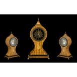 A Satinwood Inlaid Balloon Shaped Mantel Clock with a Black Marble Chapter Ring with Gilded Roman