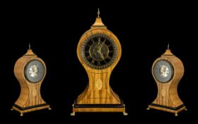 A Satinwood Inlaid Balloon Shaped Mantel Clock with a Black Marble Chapter Ring with Gilded Roman