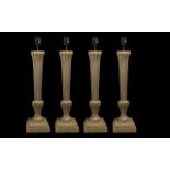 Collection of Four Modern Table Lamps, manufactured by Oka, or classical fluted columns in a stone.