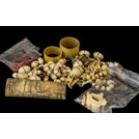 Bag Mixed Antique Ivory Items including beads, serviette rings, necklaces, handles,etc.